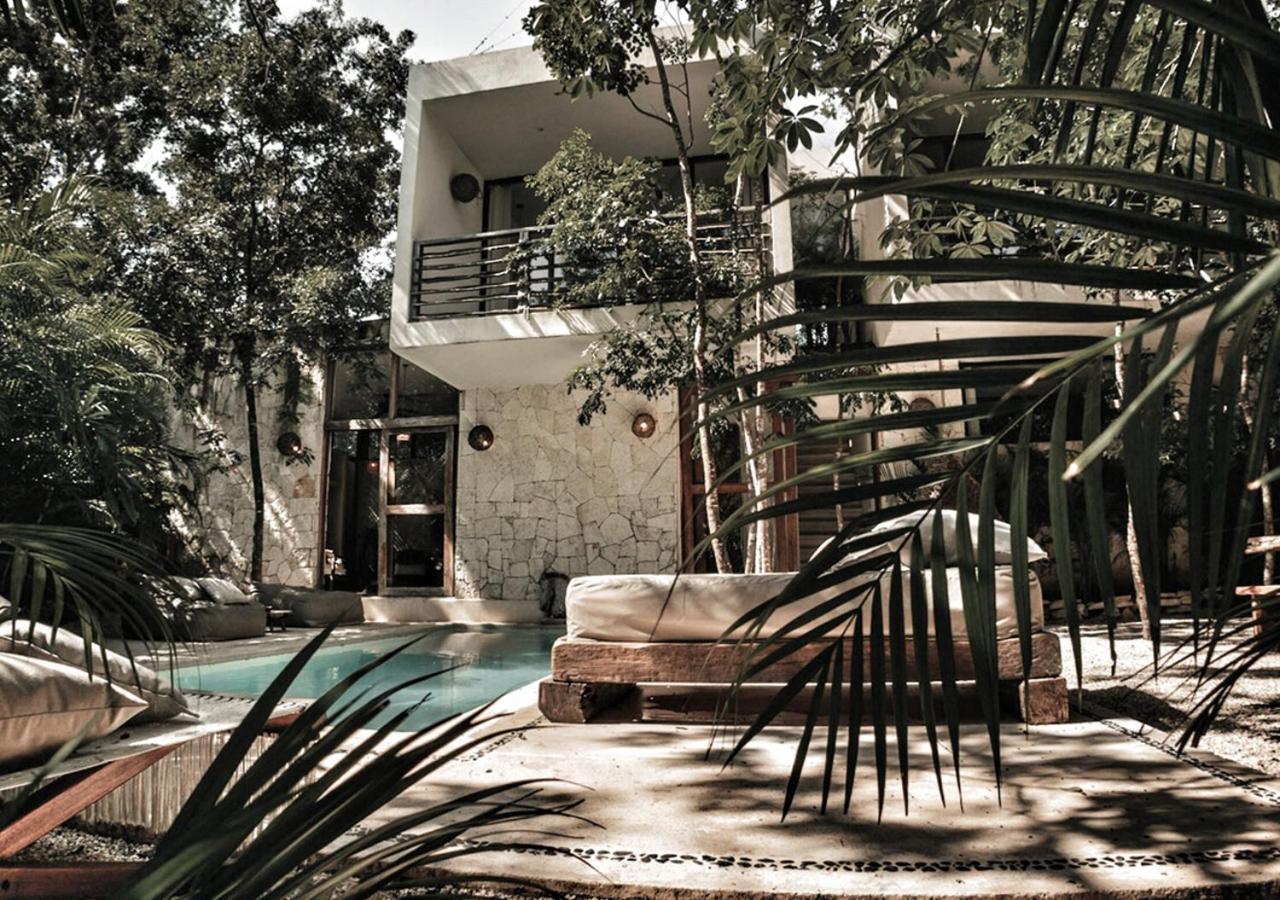 Una Vida Tulum Rom bilde