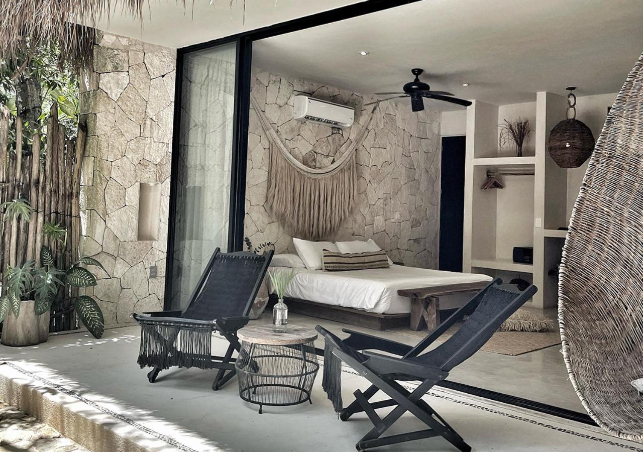 Una Vida Tulum Rom bilde