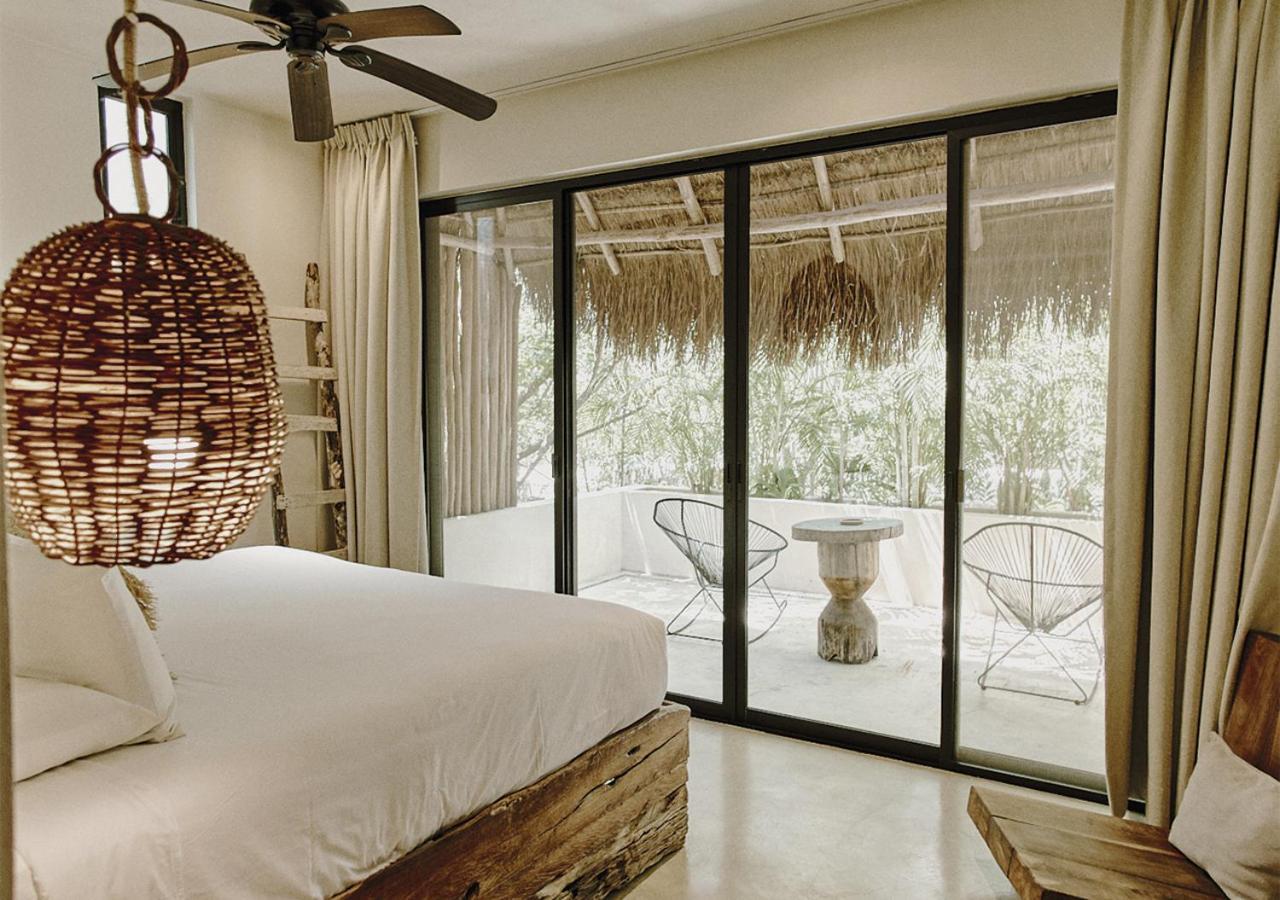 Una Vida Tulum Rom bilde
